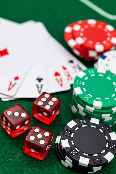 Caribbean Stud Poker live dealer interface on idamantoto login showing player and dealer cards